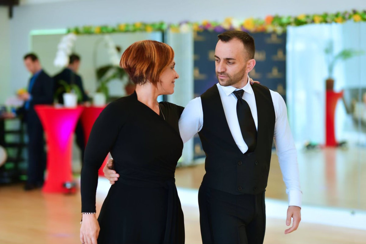 A student and her instructor together on the floor at VM Ballroom Dance Studios